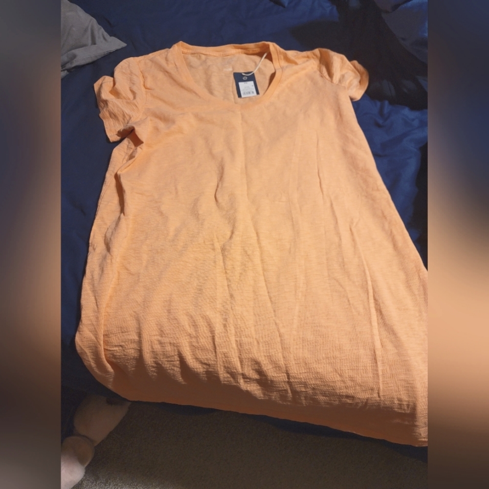 Peach colored tshirt dress.